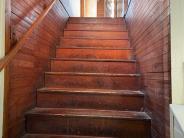 Old wooden stairs to second floor
