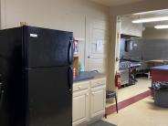 first floor kitchen black refrigerator