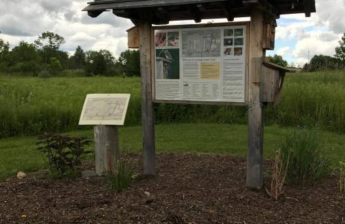 Trail kiosk on a cloudy day