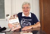 Louise Bement with book
